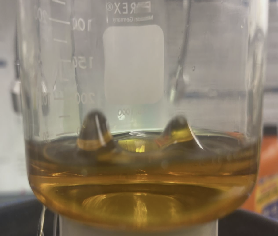 Standing surface-wave peaks in oil during the Faraday-instability experiment.