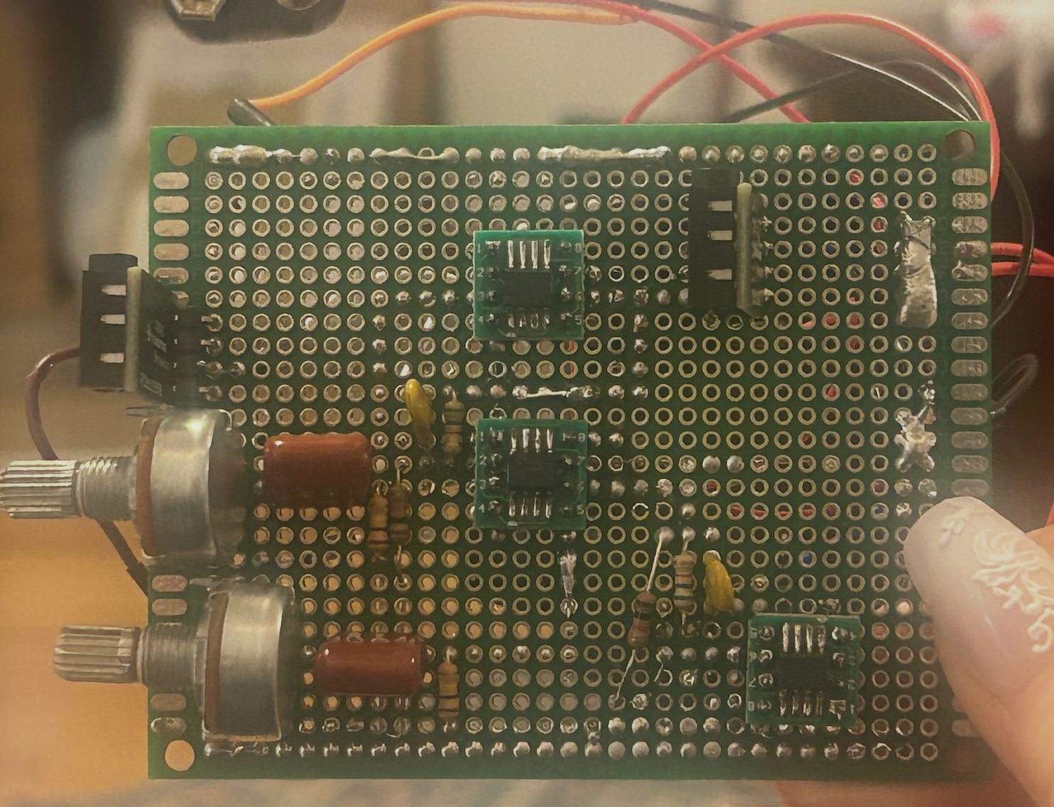 Two-channel headphone amplifier prototype assembled on perfboard.